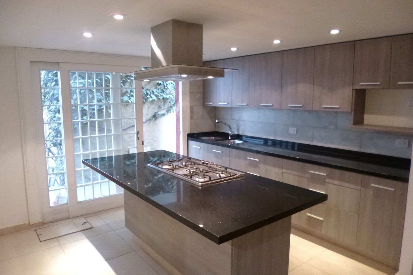 Cocina de Casa Agua Escondida después de la remodelación de Rojo MX